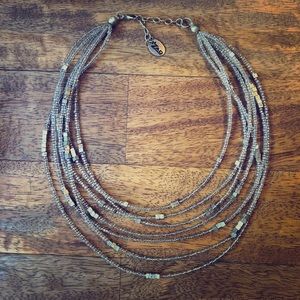 Multi-strand silver beaded necklace